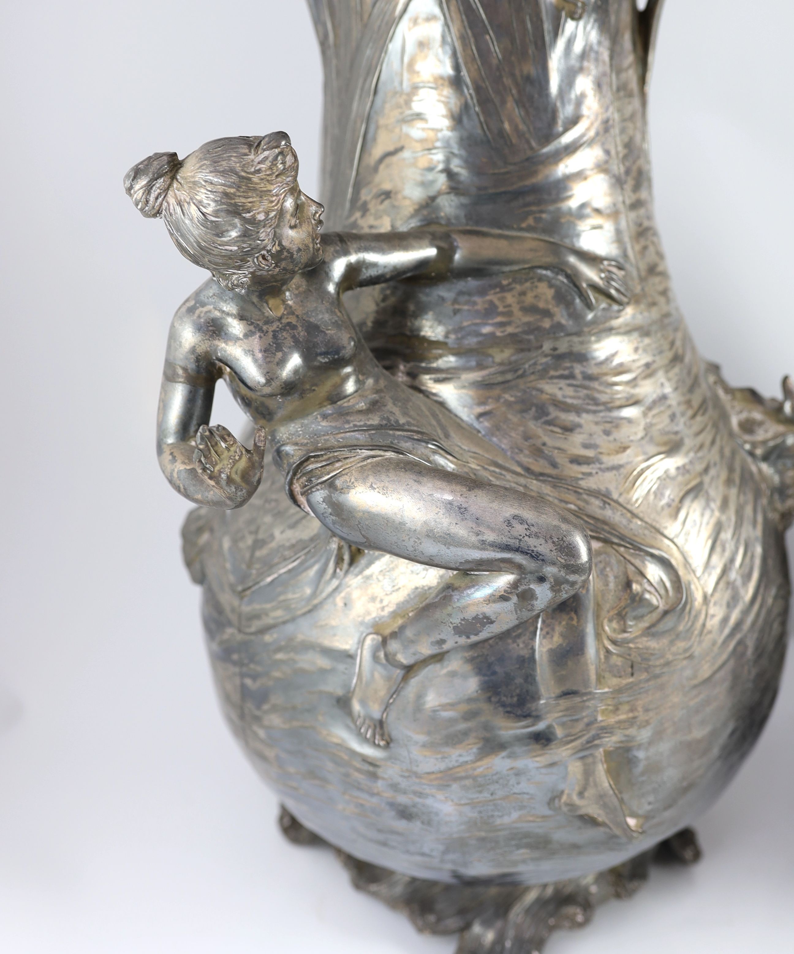 A pair of very large WMF Art Nouveau silvered pewter vases, height 61cm